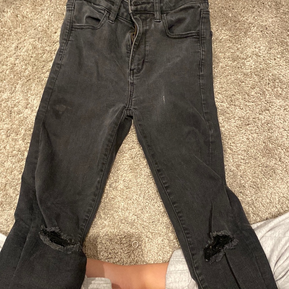 ripped black jeans